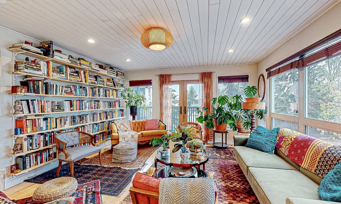 South Addition Apartment | Downtown, art-filled apartment with fireplace, balcony, & well-equipped kitchen
