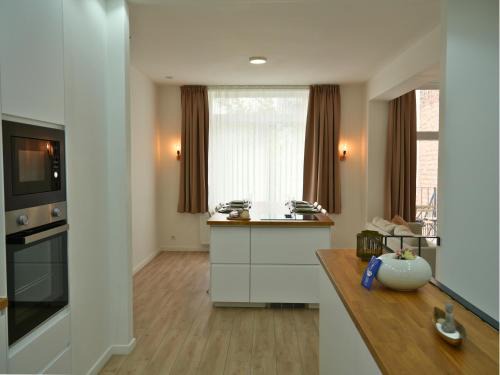Sint-Agatha-Berchem Apartment | Duplex familiale 3 chambres, 3 salles de bains & jardin à Bruxelles by CYGO Gestion