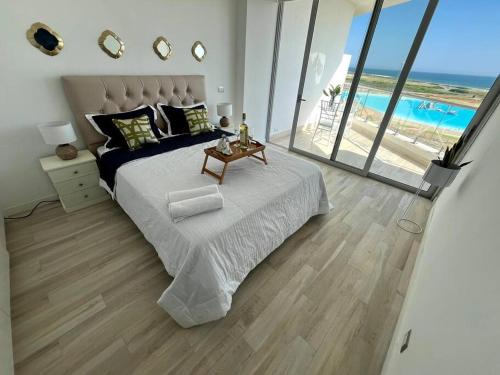 Coastal Region Apartment | Ecusuites Playa privada Room 1 Karibao