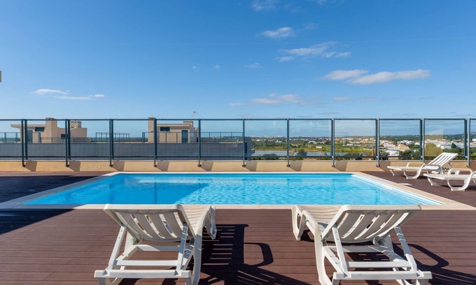 Olhao Apartment | Elegant 2 BDR Flat W/Rooftop Pool by LovelyStay