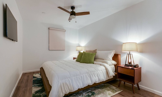 San Angelo Hotel | Elegant Suite with Separate Living Room & Mini Fridge – Ideal for Relaxation and