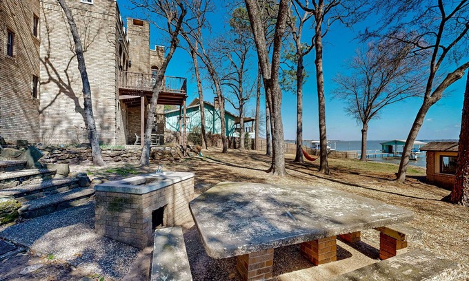 Tool House | Elegant & unique abode with canoe, kayaks, dock, grill, wood fireplace, W/D, AC