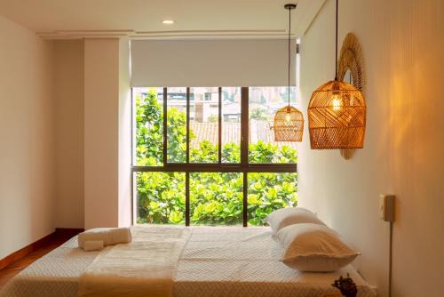 El Castillo Apartment | Elegante habitación baño compartido en Poblado-B11