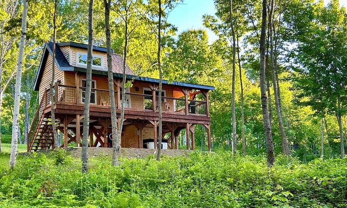 Canterbury Cabin | Elevated cabin nestled among the trees, and the Saint John River. Pet friendly.n