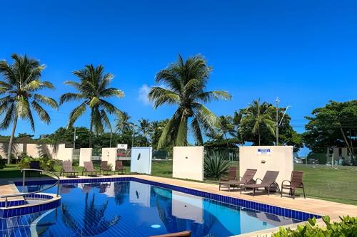 Taperapua Beach House | EM frente à PRAIA; 2 quartos; WiFi 300 mbs; até 6 pessoas; no 2 pavimento; Estacionamento Gratuito 1 carro