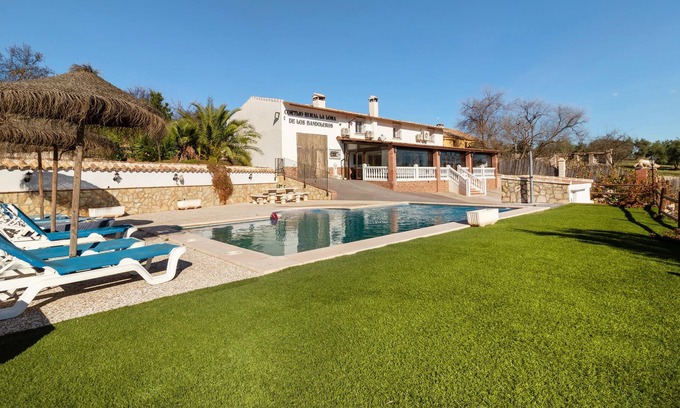 Cuevas de San Marcos House | Enjoy a unique view of the countryside in this inviting vacation home with pool.