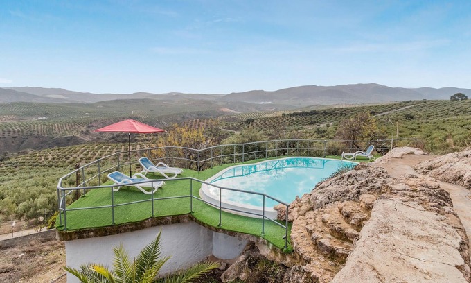 Priego de Cordoba House | Enjoy a unique view of the countryside in this comfortable vacation home with pool.