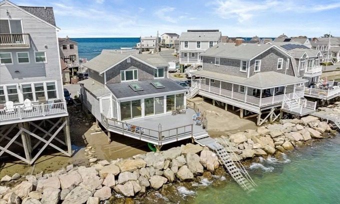 Scituate House | Enjoy serene oceanfront home with harbor views.