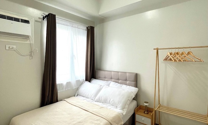 Manggahan Condo | Escape to 1028Suites! 2BR SMDC Charm Unit w/PS5 & 2 Pools!