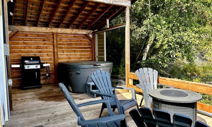 Grondines Cottage | Escape to Riverfront, Relax with Hot Tub, BBQ