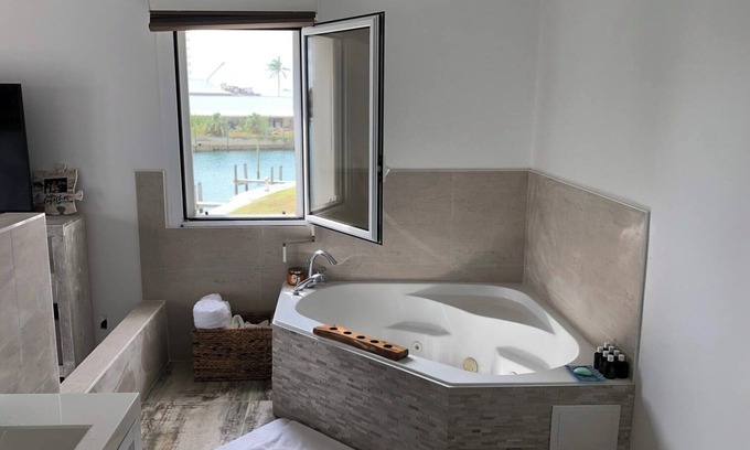 Bahamas Terrace House | European designed townhouse with boat dock access and 5 mins walk from beach.