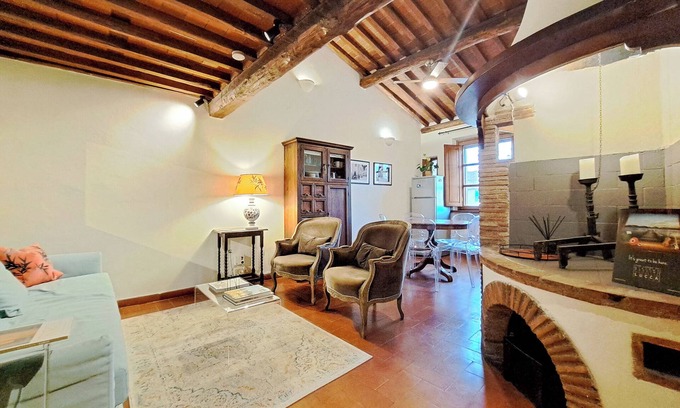 Lucca Historical Center Apartment | Exclusive retreat in the historic center of Lucca, overlooking Piazza Anfiteatro