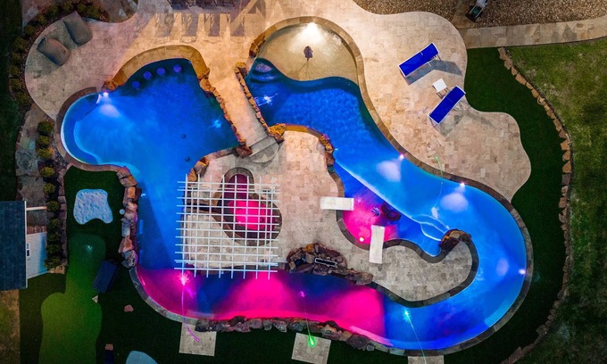Spring House | Extended-stay paradise: lazy river, theater, poker, Peloton, mini golf and more.