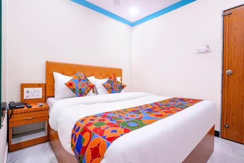 Malad West Hotel | FabExpress Raj Palace - 1 km to Sakinaka Metro