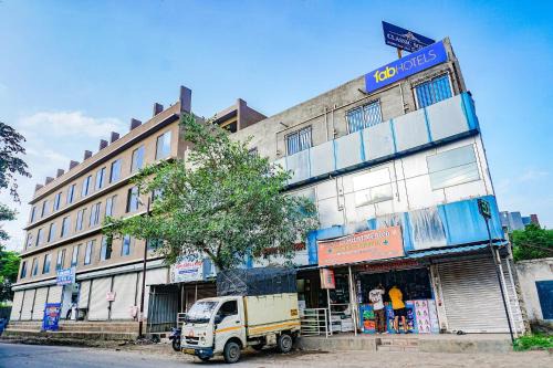 Wagholi Hotel | FabHotel Classic Square I