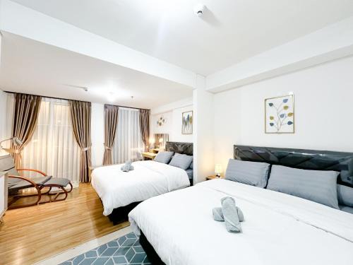 Arjuna Apartment | Family Suite at Landmark Residence