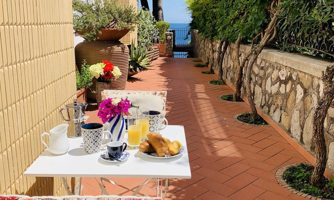 Marina del Cantone Apartment | Felicia's corner studio apartment 2 steps from the sea