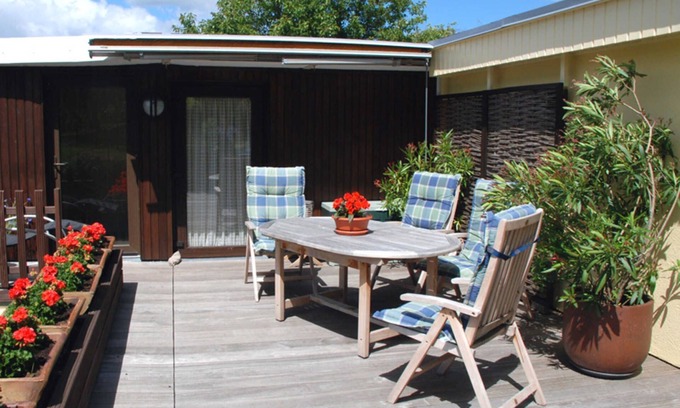 Seedorf Apartment | Ferienappartement Having - Holiday apartments under a thatched roof with lake view