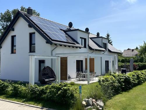 Krummin Apartment | Ferienhäuser Ankerplatz 1 und 2 Usedom mit Sauna, Kamin und Garten