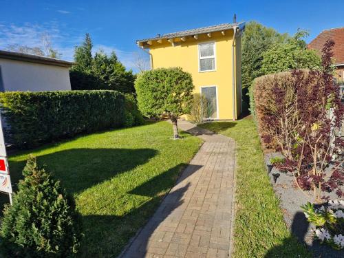 Sagard House | Ferienhaus an der Brunnenaue 4 Sterne, E-Ladestation am Haus, Wlan, Netflix, Garten