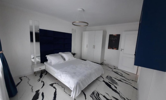Craiova Apartment | Flamingo Apartment1 Craiova self check-in
