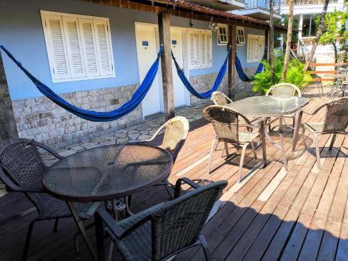 Conservatoria Apartment | Flat e suítes com deque, cozinha e churrasqueira