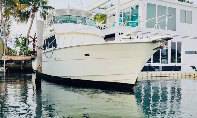 Key West Boat Rental | Floating Island Escape: Spacious 65' Hatteras Boat, Full Amenities & Sun Deck