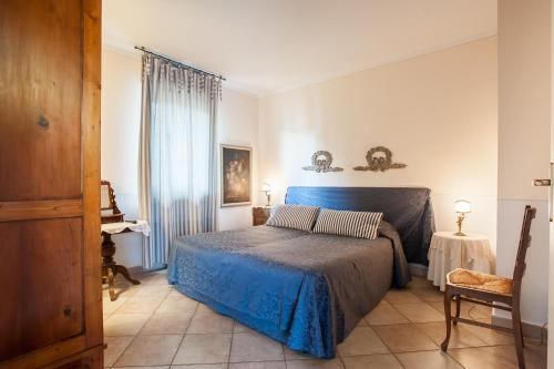 Quartiere di Porta Crucifera Bed & Breakfast | Francesco Redi Camere