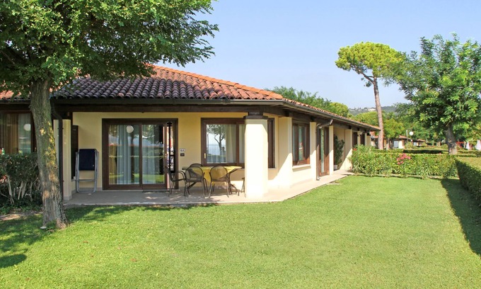 Monte House | Front Lake Resort Le Corti del Lago by Interhome