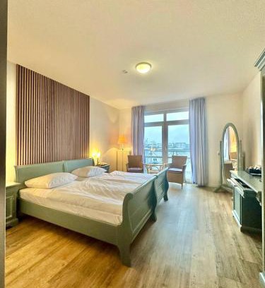 Juliusplate House | Gästehaus Weserblick am Weser-Sandstrand