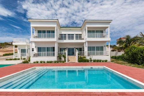 Juba Sound Apartment | Get Ready for Ocean Views, Pool, and Beach Fun