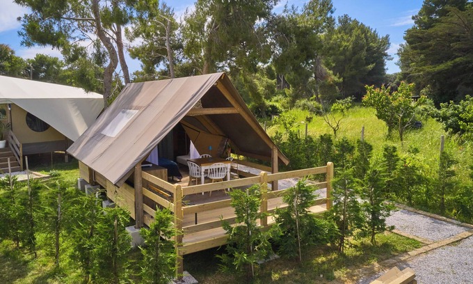 Piombino RV Rental | Glamping 'Tenda Safari Vicino Al Mare' with Shared Garden, Wi-Fi and Air Conditioning