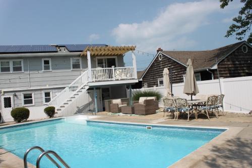 Point Pleasant Beach House | Gorgeous beach house with large pool & private beach, just 3 blocks away!
