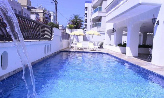 Jardim Praiano Apartment | Guaruja - 2 Quartos - Ar condicionado - Varanda