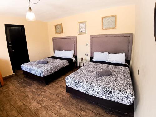 Durango House | Habitación arena, Paseo Durango