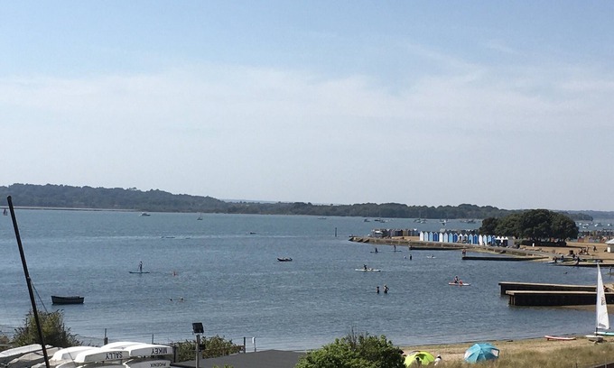 Hamworthy Apartment | Harbour Lights sea and beach views with a Caribbean-style and secure parking