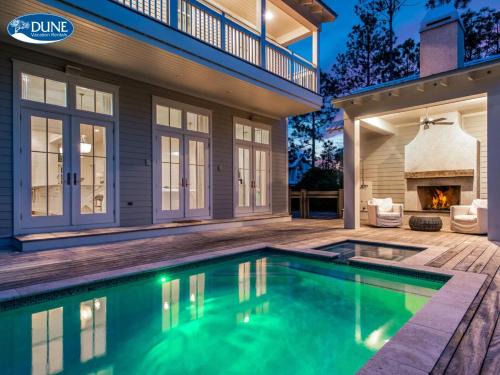 Watercolor House | 'Here Comes the Sun' has a Private Pool, 6 Seat Golf Cart, and Stunning Outdoor Living Space home