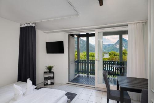 Darligen Apartment | HID AG: Lakeview Studio mit Parkplatz und Balkon