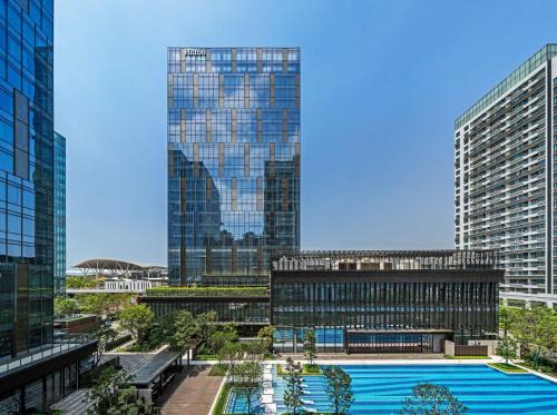 Shajing Hotel | Hilton Shenzhen World Exhibition & Convention Center - Only 5 minutes' walk to WECC