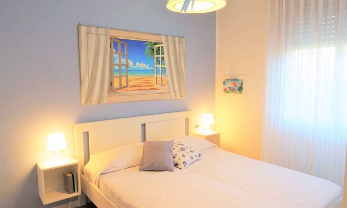 Bibione Apartment | Holiday apartment on the ground floor with garden and shared swimming pool