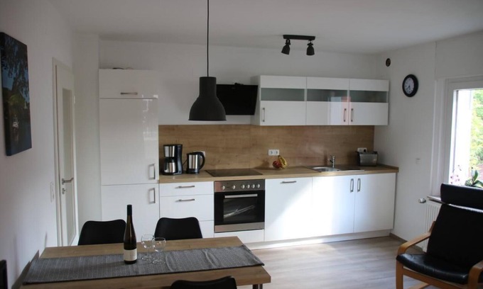 Alf Apartment | Holiday flat in Alf with balcony and air conditioning