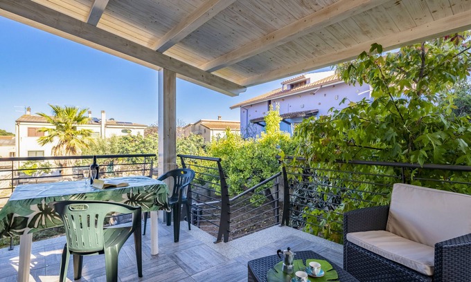 Bari Sardo House | Holiday Home Appartamento LaTorre with Balcony, Terrace & Shared Garden