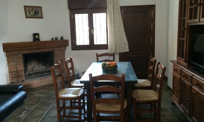 Guejar Sierra House | home eras (the sunny farmhouse) with fireplace town center