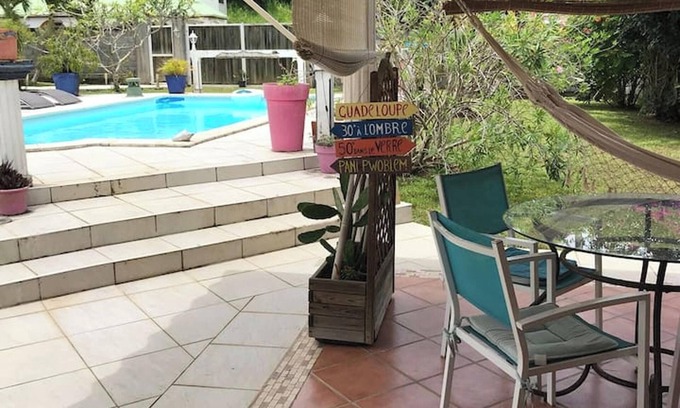 Doubs Apartment | Homerez - Cosy Studio in Les Abymes