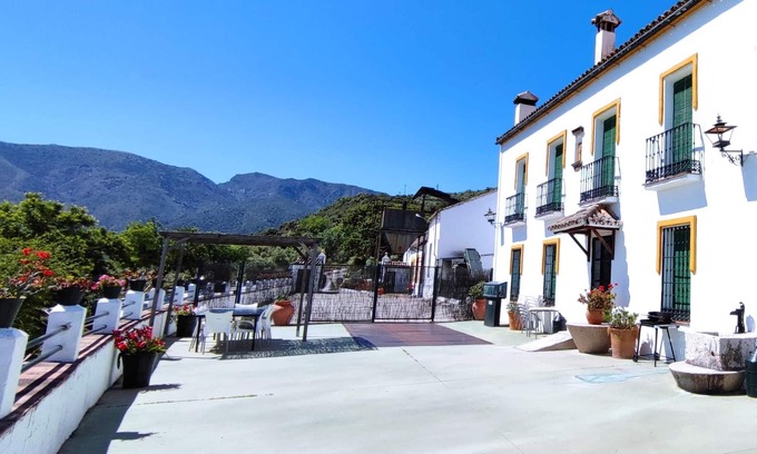 Zahara de la Sierra House | Homerez - House for 12 ppl. with shared pool and garden at Zahara de la Sierra