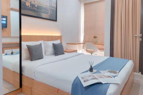 Ciputat Apartment | Homey Studio at Transpark Bintaro Apartment By Travelio