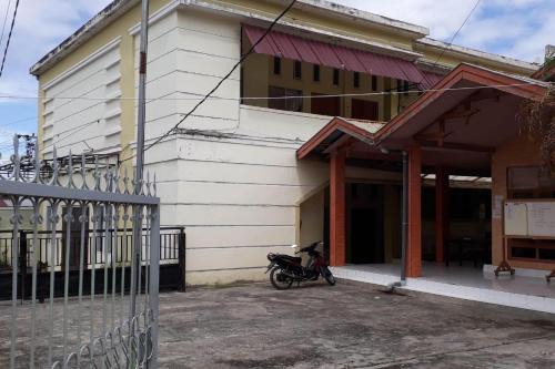 Luwuk Hotel | Hotel O Homestay Ananda Luwuk