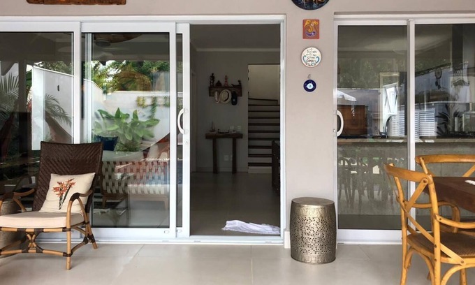 Barra do Una House | House 300 meters from the beach, with barbecue area, pool and sauna