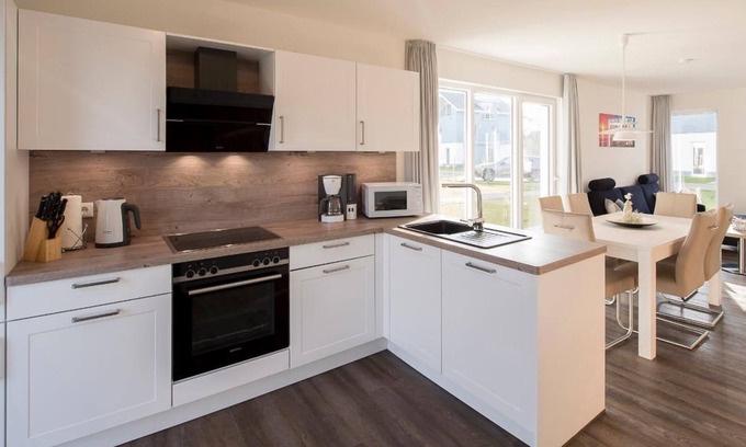 Schillig House | House no. 06, Ferienhaus Deichgraf - Modern vacation home, sauna, south-facing terrace,