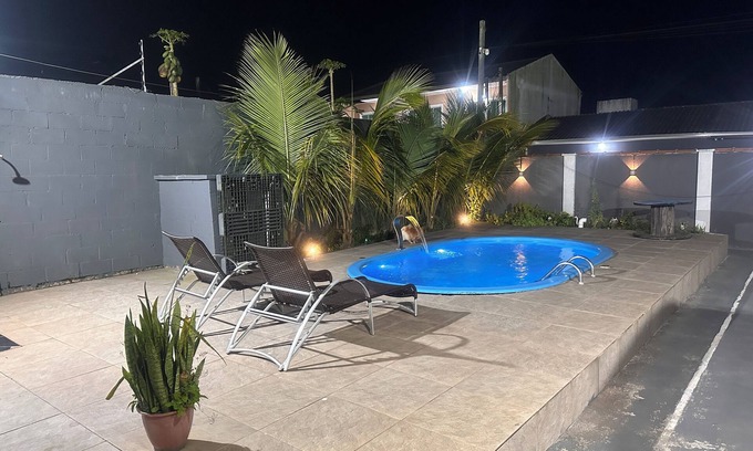 Matinhos House | House with pool, air conditioning located in a quiet resort, 60m from the sea